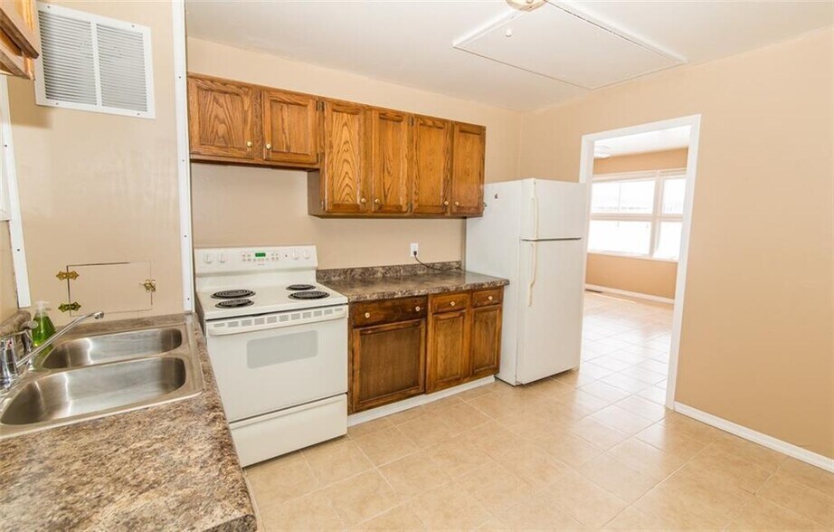 Kitchen has easy to clean tile floors. - 2950 N Ritter Ave