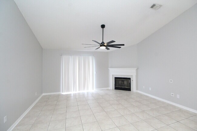 Building Photo - West Pensacola Brick Home with Vaulted Ceilings, Split Floor Plan, Open Living Design & Easy Acce...