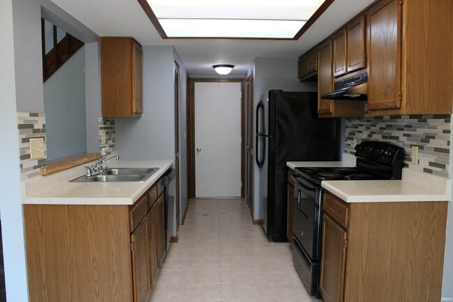 Building Photo - 6034 Sawmill Woods Dr