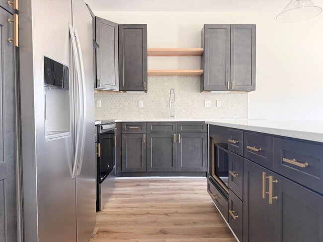 Building Photo - Fuller Style - Spacious 2-Bedroom Townhome with Flex Room at Highbury