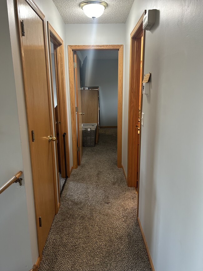 Hallway upstairs to bathroom and bedrooms - 6382 207th Street North