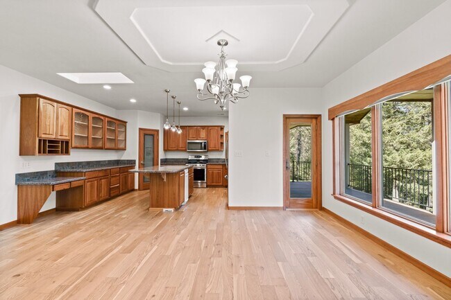 Building Photo - 6 Bed 4 Bath Daylight Rancher on Acreage in Mead School District.  Absolutely Gorgeous