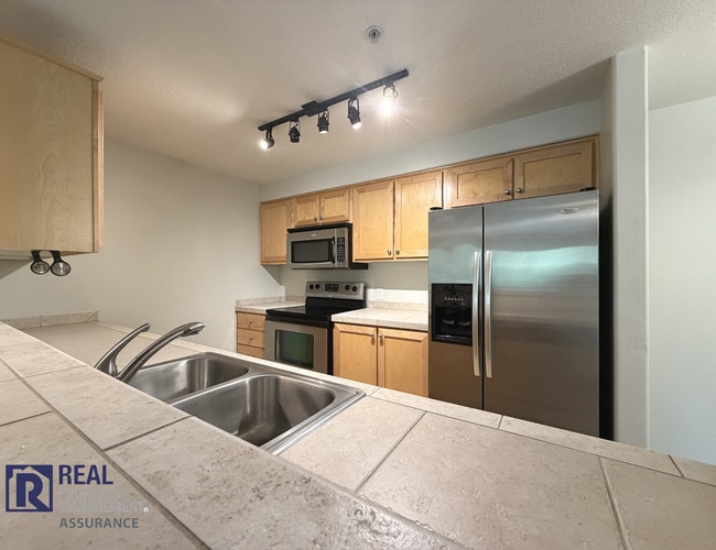 Building Photo - Tanasbourne 2BR/2BA Condo | Balcony, A/C & Covered Parking