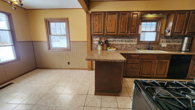 Building Photo - 4-Bedroom, 2 Bathroom Easthill Home with Bonus Room, Finished Lower Level, and Garage