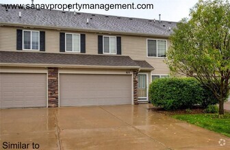 Building Photo - Charming 2 Bed, 1.5 Bath Townhome with 1-C...
