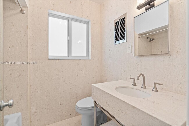 Building Photo - 10190 Collins Ave