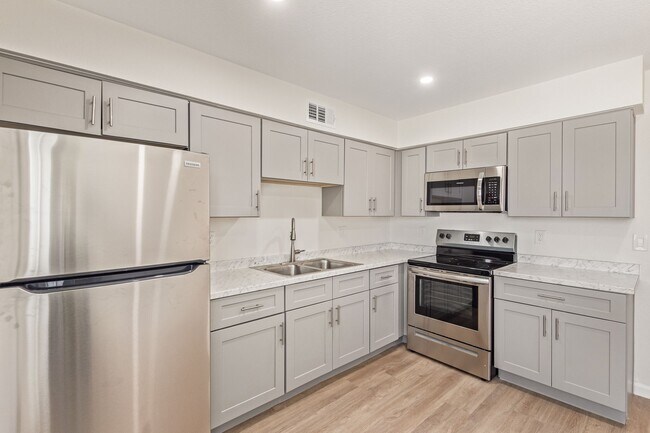 Building Photo - Stylish. Newly Renovated. Cozy, Boutique Community - On Broadway Apartments