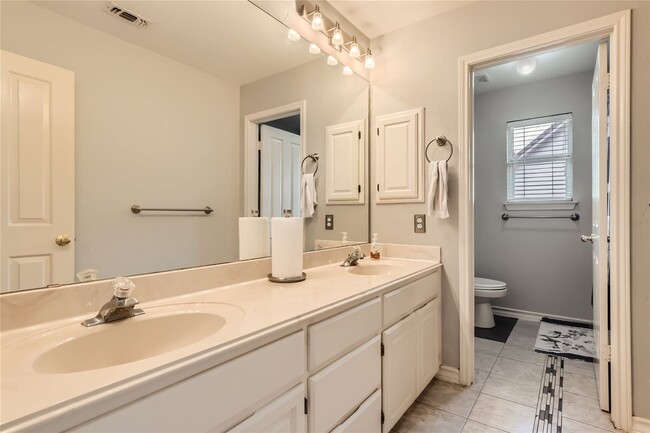 Building Photo - Stunning Home in Guard Gated Community ~ I...