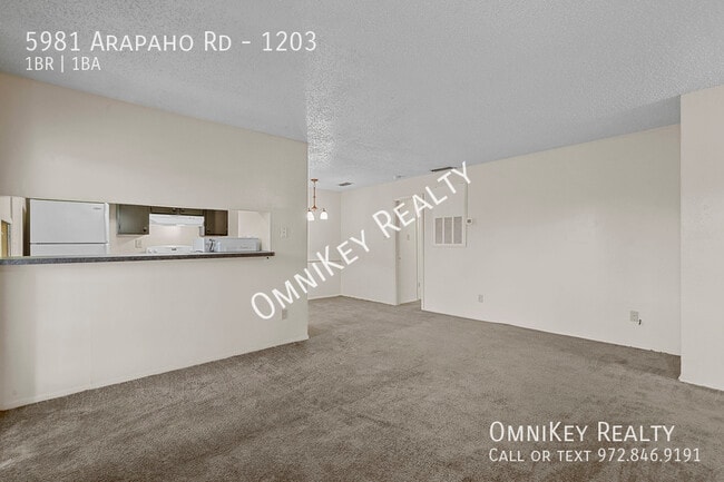 Building Photo - 5981 Arapaho Rd