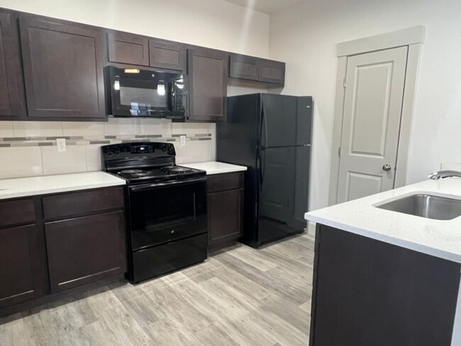 Building Photo - WELCOME TO SUNBEAM TOWNHOMES