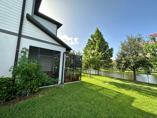 Building Photo - Lease this 3BR End-Unit Townhome in Gated Community with Water View!