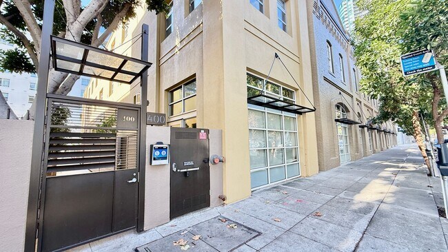 Building Photo - 12 Month Lease Term: Furnished 1BR Loft-style w/Den condo a block from The Embarcadero, Includes ...