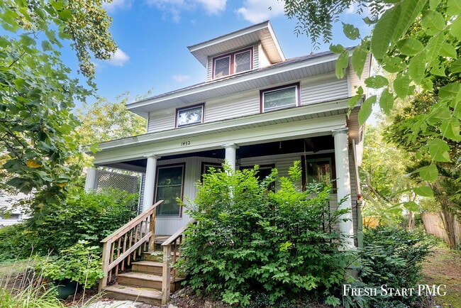 Primary Photo - Spacious 3-Bedroom Haven with Sunroom & Wa...