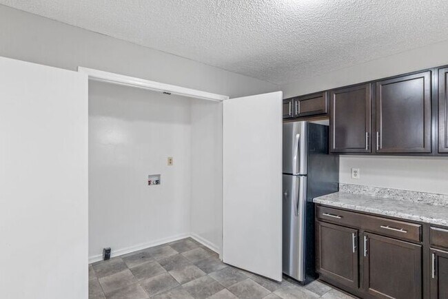 Building Photo - NE Home - Updated Kitchen and Bathrooms! SS Appliances, Fire Place, Front Porch & Deck, Fenced Yard!