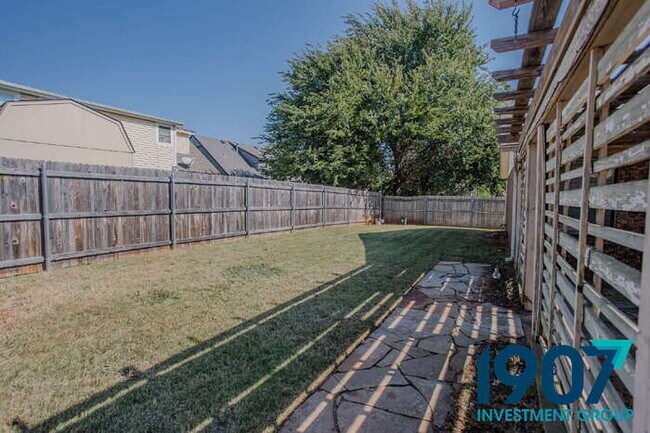Building Photo - Charming Brick Home with Large Backyard in OKC! - Move In Now & Get 50% Off Your First & Second M...