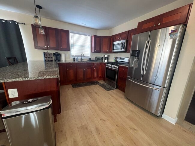 Building Photo - 239 N Derby Ave