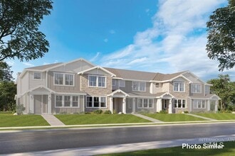Building Photo - Immaculate Townhouse w/2-Car Garage