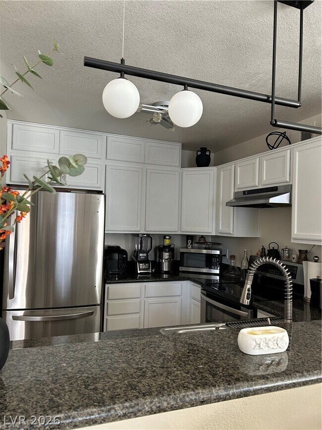 Building Photo - 9325 W Desert Inn Rd