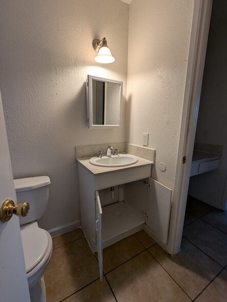 Upstairs BR + shower stall sink to the right - 251 Coventry Dr