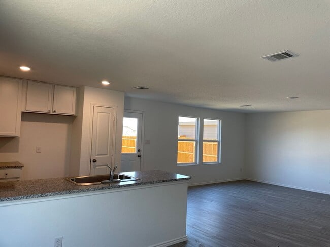 Building Photo - Spacious 4-Bedroom Home with Huge Backyard...