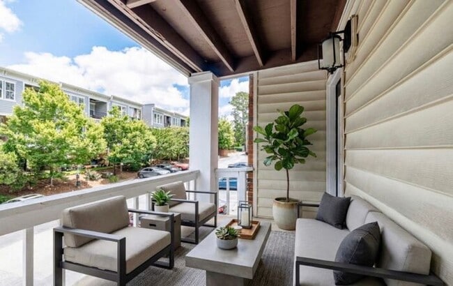 Building Photo - Spacious 2-Bedroom Elite Apartment with Private Balconies & Washer/Dryer