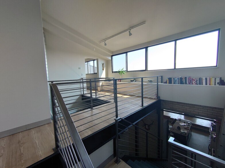 lofted staircase - 730 Stinson Blvd