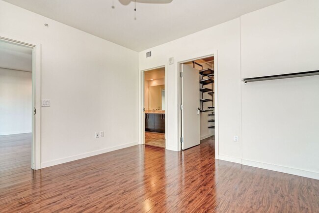 Building Photo - Modern Downtown Condo in Premier High-Rise...