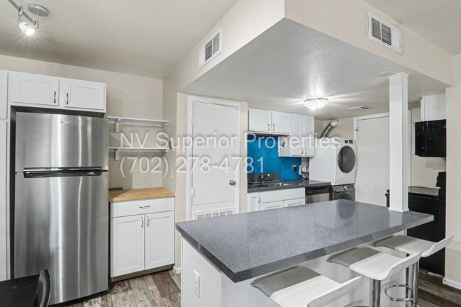 Building Photo - SE!! Close to UNLV!! 2 Bedroom 2 story!! 1 Car Carport!! Fully Furnished!! Community Pool!! and T...
