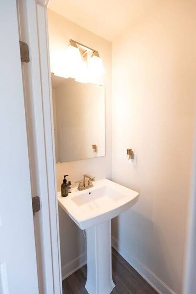 Building Photo - Available Now! Discover urban living at its finest in this 4-level gem!