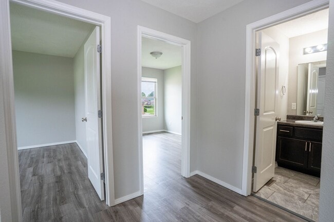 Building Photo - 3 bed home with NEW FLOORING AND FULLY FEN...