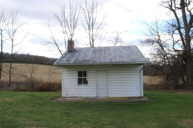 Building Photo - Country Charm in this 2.5 Story Farmhouse