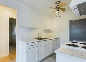 Building Photo - Discover a unique opportunity with this ce...