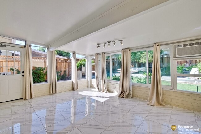 Building Photo - Turnkey Home with Natural Light & Upgrades...