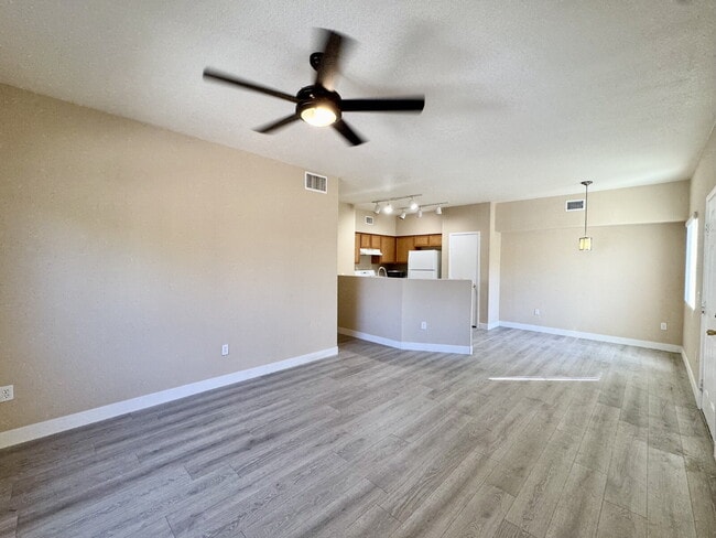 Building Photo - DOWNSTAIRS CONDO | GATED COMMUNITY | CENTENNIAL HILLS | UPDATED 3 BEDROOM