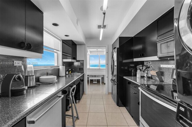 Building Photo - 4925 Collins Ave