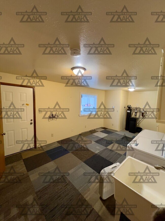 Building Photo - Spacious 3BR, 2.5BA Home off Chena Hot Springs Rd with Yard, Deck & Greenhouse