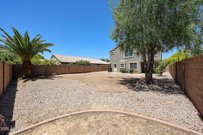 Building Photo - 7315 W Fleetwood Ln
