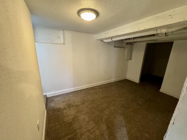 Building Photo - 2 Bedroom Home with Partially Finished Bas...