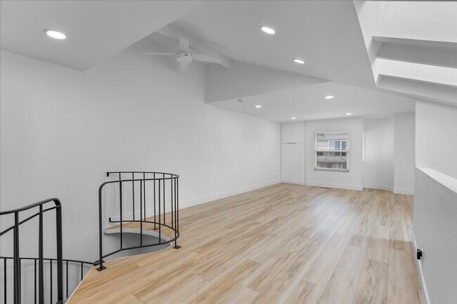 Building Photo - COMPLETELY REMODELED, BRIGHT & AIRY, TRI-LEVEL HOME W/ TOP-FLOOR GREAT ROOM LIVING SPACE, 2-CAR G...