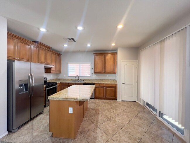 Building Photo - 4 bedroom, 3 bathroom home located in Southwest, NV!