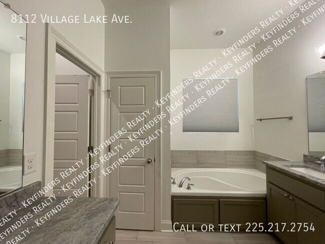 Building Photo - 8112 Village Lake Ave