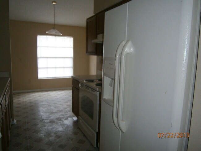 Building Photo - 3/2 Single Family Home with EXTRA Large Backyard