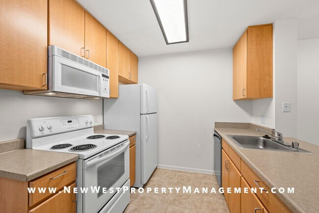 Building Photo - Charming Little Italy 1-Bedroom at Portico! Small Pet OK! Available Now!