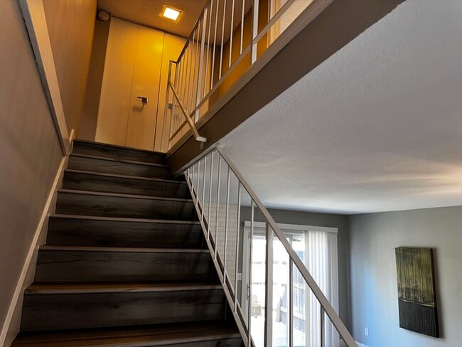 Building Photo - Charming 2-Bedroom Condo with Fireplace & ...