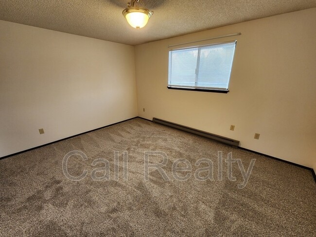 Building Photo - 10811 E 26th Ave