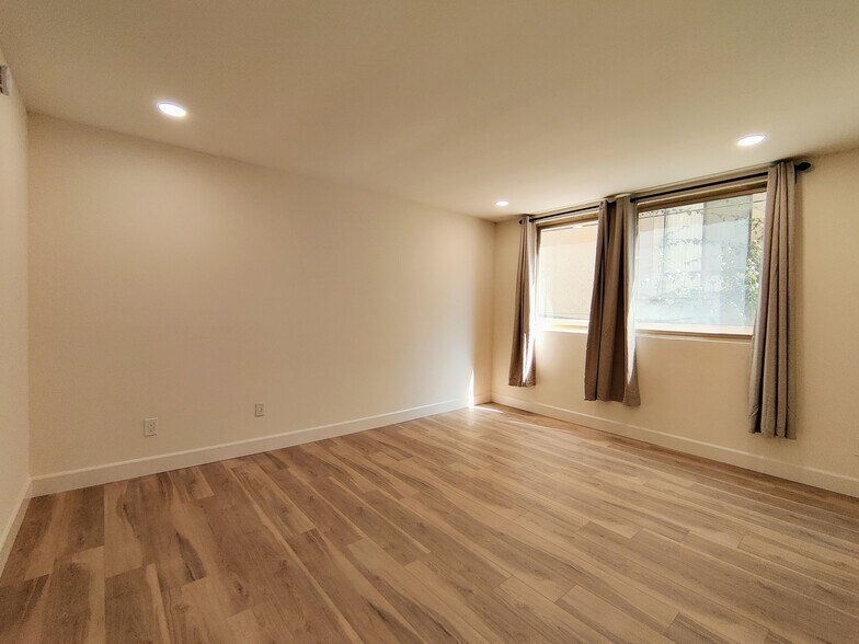 Spacious Primary Bedroom - 1300 Midvale Ave