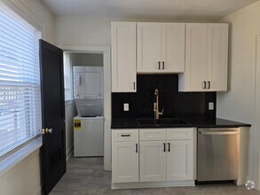 Building Photo - NEWLY RENOVATED APARTMENTS near Rooster on...