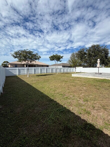 Backyard fully fenced - 2120 NW 18th Ave