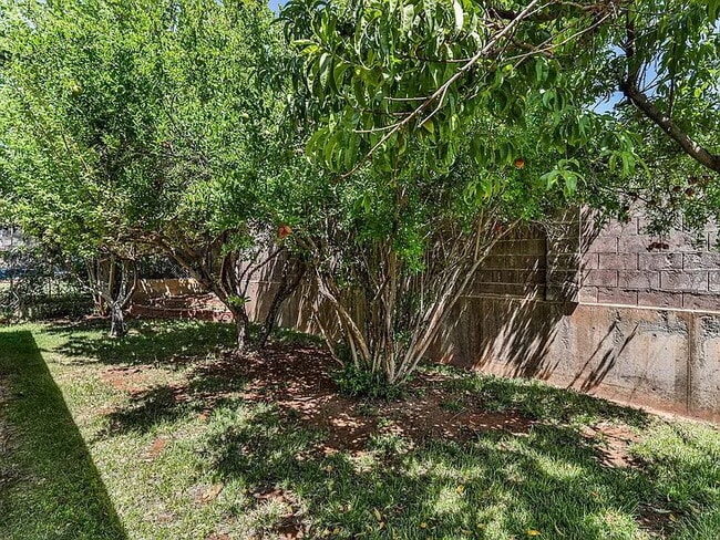 Building Photo - "Charming 4-Bed Oasis with Elegant Hardwoo...