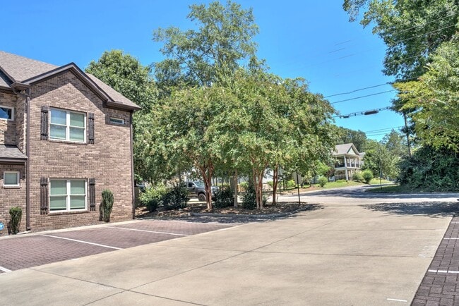 Building Photo - Heisman Villas: End Unit with Parking & Pr...
